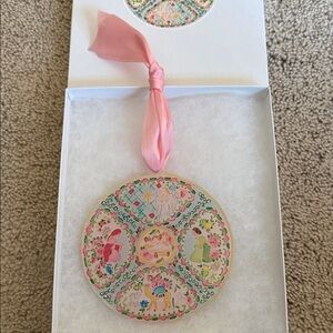 Colorful Round Ornament with Pink Ribbon